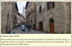 Cruising main street Once inside the city, the main street will take you right up a small hill to the city’s piazza.  A major water well is in the piazza, along with the business district for San Gimignano.  This is another good place for leather goods.